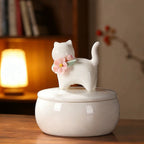 Beautiful small Amberra ceramic porcelain white urn to store the ashes of cat and keep the memory alive