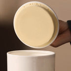 Beautiful small medium Amberra ceramic porcelain white urn to store the ashes of cat and keep the memory alive
