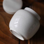Beautiful small Amberra ceramic porcelain white urn to store the ashes of your hamster, rabbit, small dog, cat or other pet