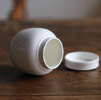 Beautiful small Amberra ceramic porcelain white urn to store the ashes of your hamster, rabbit, small dog, cat or other pet