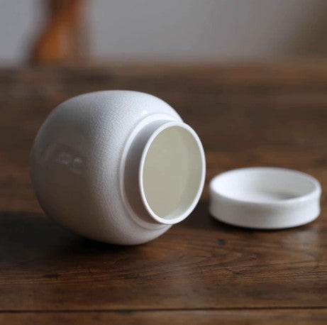 Beautiful small Amberra ceramic porcelain white urn to store the ashes of your hamster, rabbit, small dog, cat or other pet