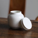 Beautiful small Amberra ceramic porcelain white urn to store the ashes of your hamster, rabbit, small dog, cat or other pet