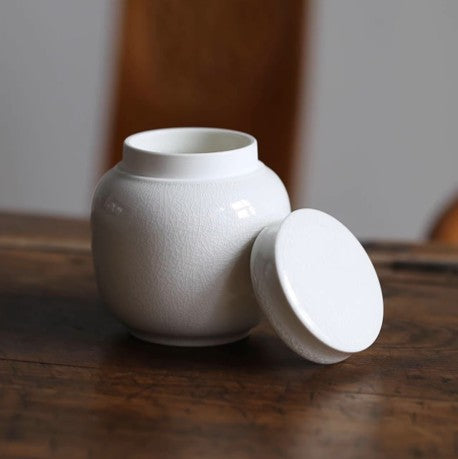 Beautiful small Amberra ceramic porcelain white urn to store the ashes of your hamster, rabbit, small dog, cat or other pet