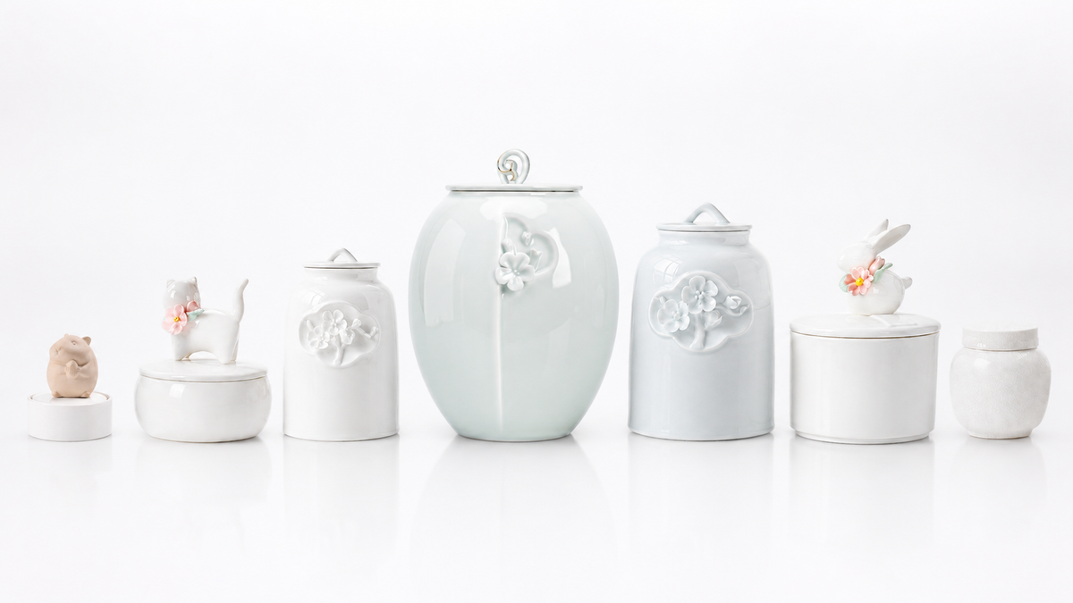 Example selection different sizes from Amberra porcelain ceramic pet urn collection