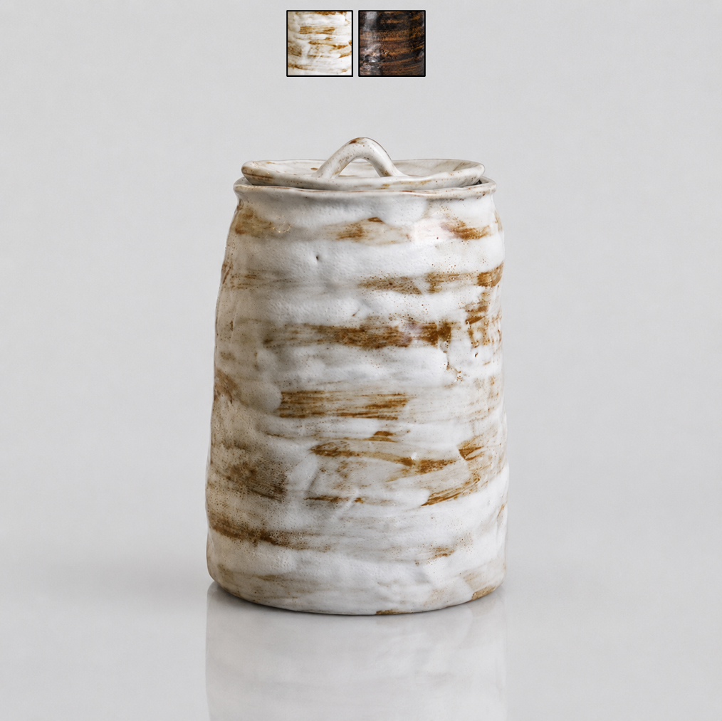 Glazed white brown artisanal pet urn with organic shape and color patterns